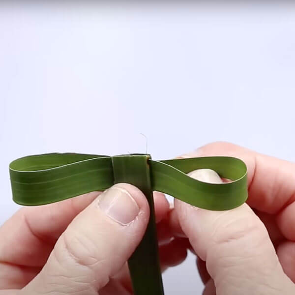 Forming the final 'T' shape of the cross