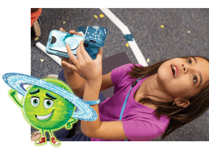 Girl playing with Imagination Station Day 2 Galaxy Gazer Kit